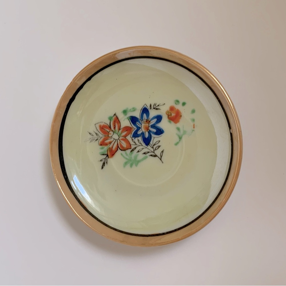 Vintage round trinket dish, peach luster with orange and blue flowers